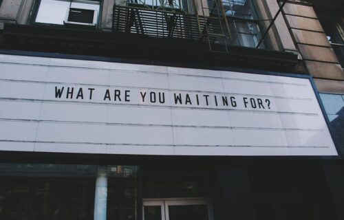 Billboard that reads: "What are you waiting for?"